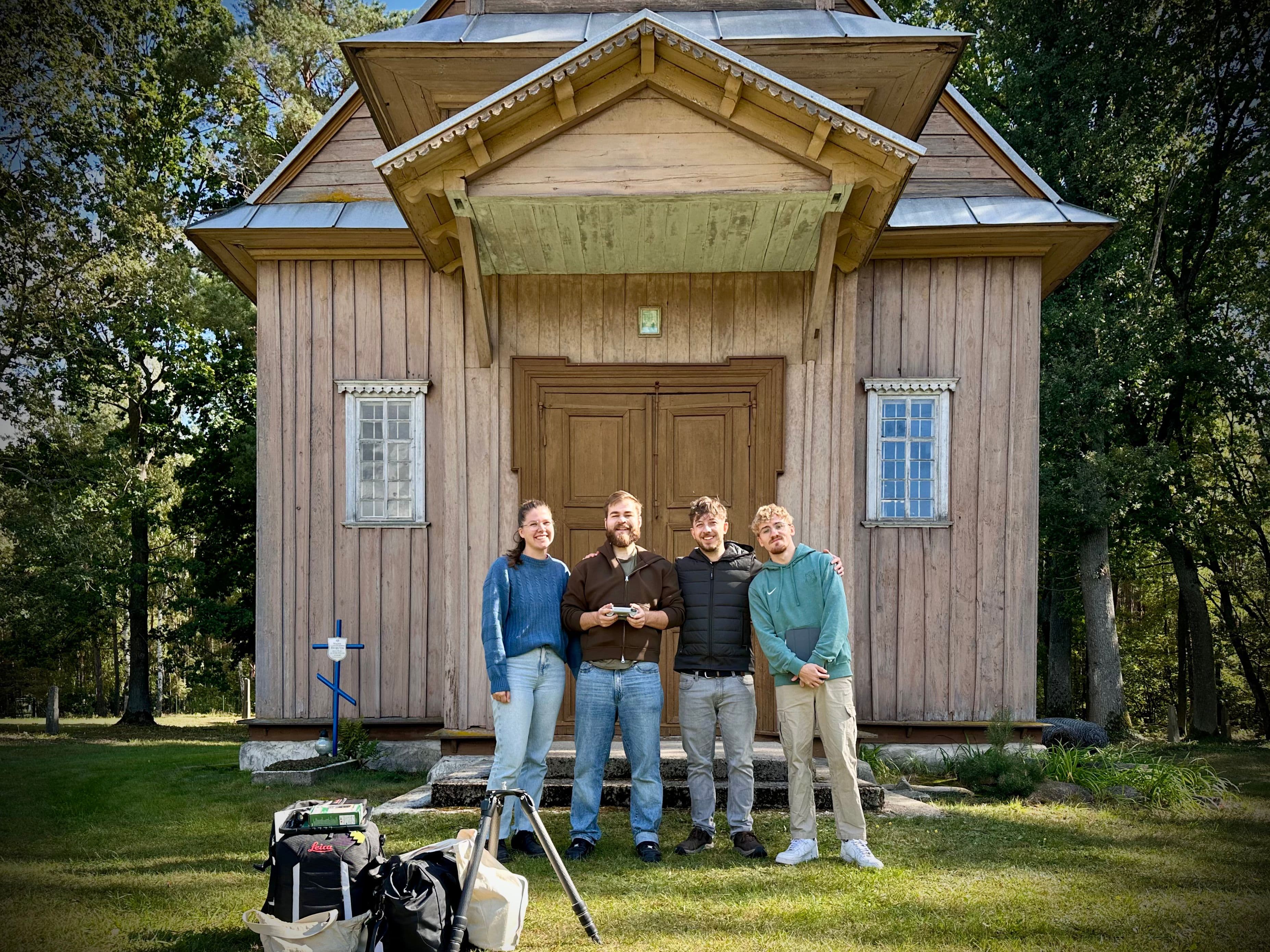 Picture of Student team in front of the surveyed building